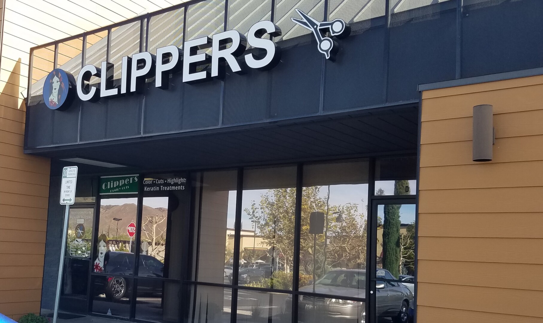 Clippers Family Cuts Remodeled Building Front